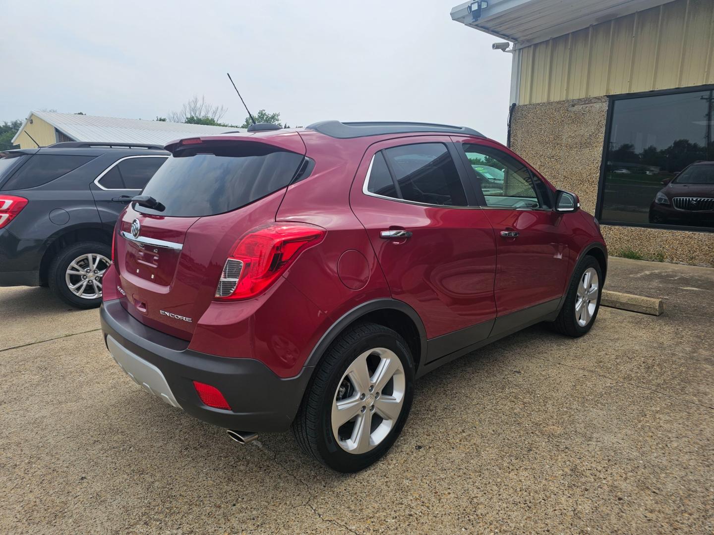 2015 MAROON Buick Encore Convenience FWD (KL4CJBSBXFB) with an 1.4L L4 DOHC 16V TURBO engine, 6-Speed Automatic transmission, located at 533 S Seven Points BLVD, Seven Points, TX, 75143, (430) 255-4030, 32.313999, -96.209351 - Photo#2